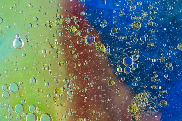 Many water bubbles over the painted textured background