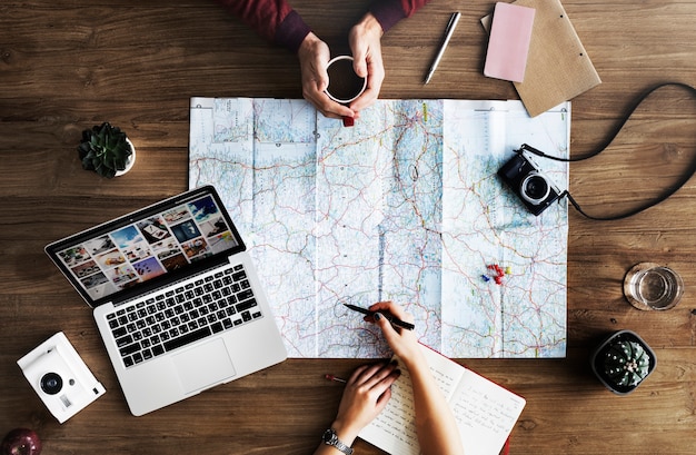 Map lying on wooden table