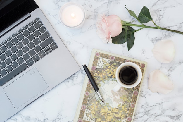 Free Photo marble desk with objects