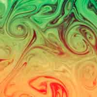 Free photo marbling red; yellow and green texture design backdrop