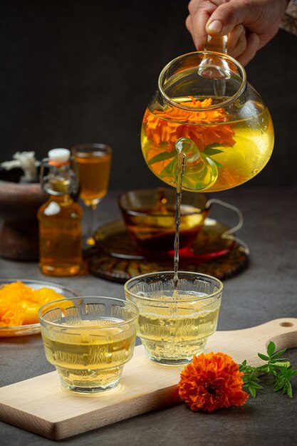 Marigold, Lemon, Honey Herbal Tea Treatment concept.