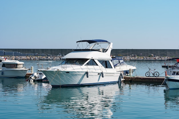 Marine parking of boats and yachts in Turkey. Yacht docked in sea port