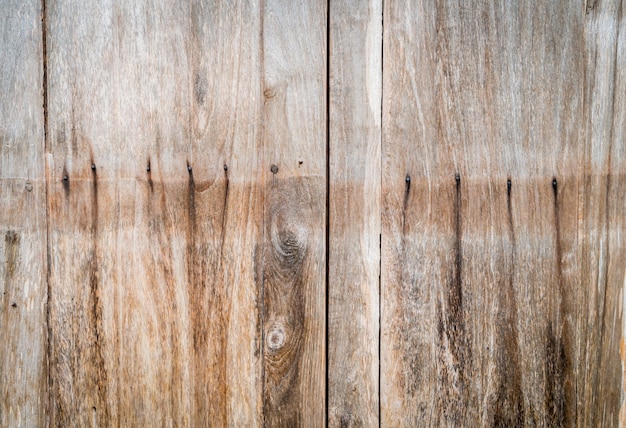 Free photo marks of nail holes on a wooden board