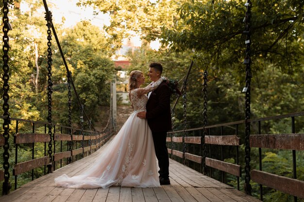 Married couple in nature full shot