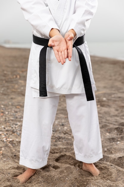 Free Photo martial arts fighter in karate costume