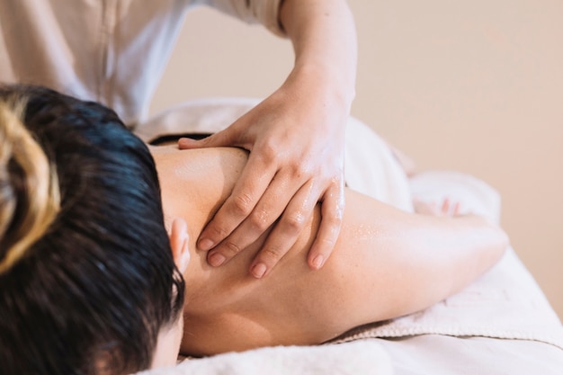 Massage concept with relaxed woman