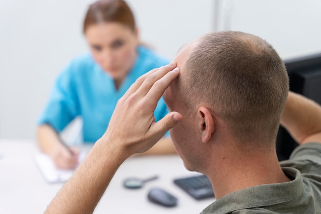 Free Photo mature man having balding problems