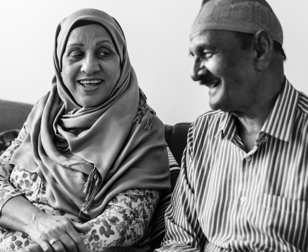 Free photo mature muslim couple at home