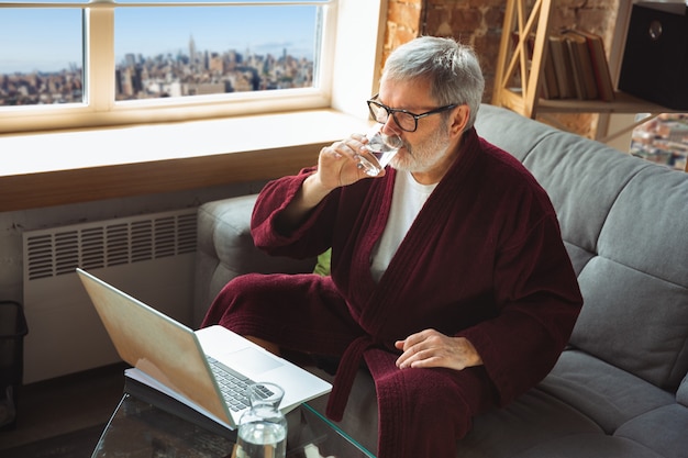 Free Photo mature senior older man during quarantine, realizing how important stay at home during virus outbreak