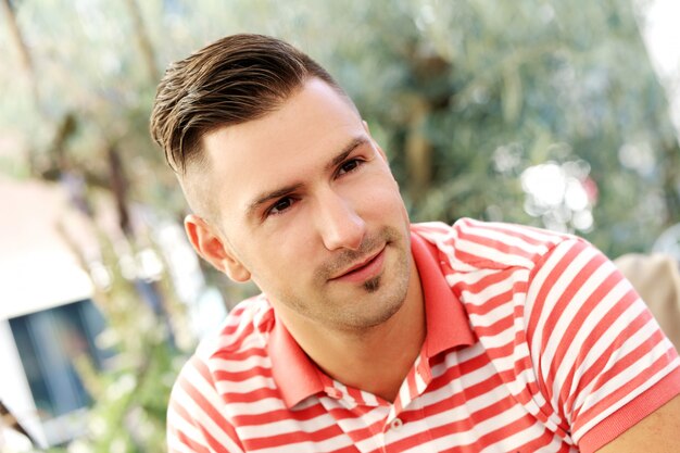 Mature and stylish man sitting in the cafe