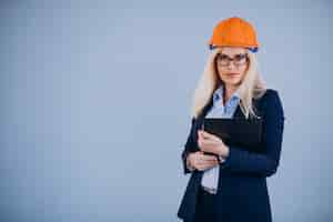 Free photo mature woman architect in hardhat