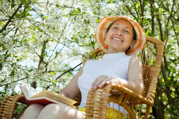 mature woman in  spring garden