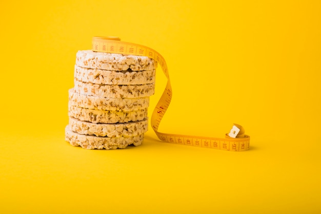 Free Photo measuring tape near crisp bread