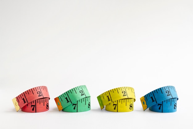 Measuring tapes arrangement still life