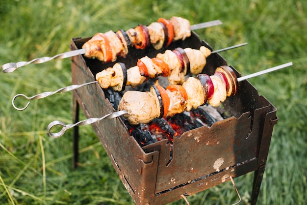 Free Photo meat on barbecue grill in nature