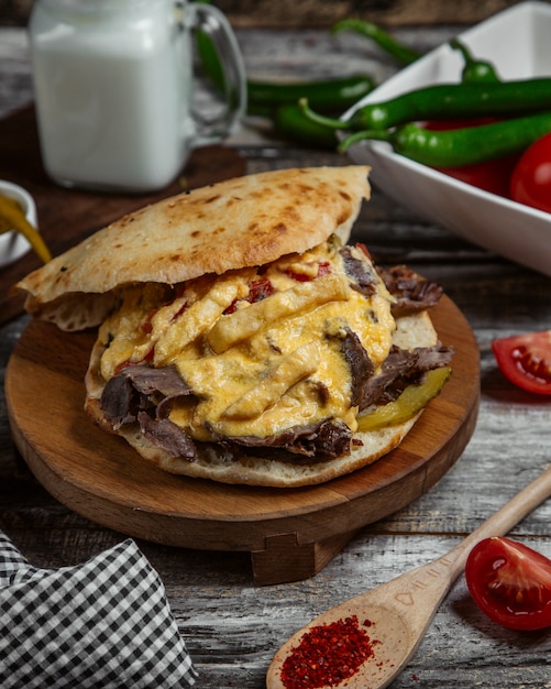 Free Photo meat in bread with melted cheese