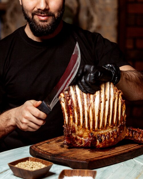 Meat master with fried meat and knife