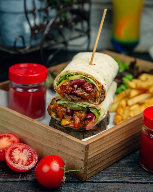 meat wrap with ketchup and fries