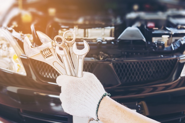 Mechanic man repairing car