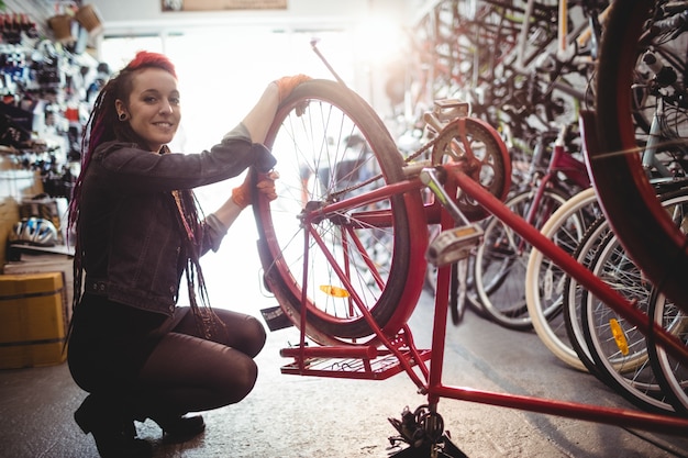 Mechanic repairing a bicycle