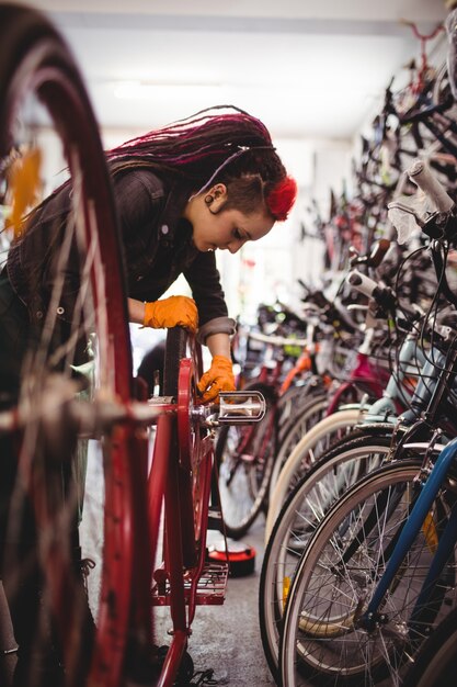 Mechanic repairing a bicycle