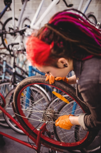 Mechanic repairing a bicycle