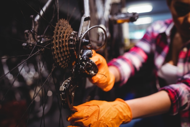 Mechanic repairing a bicycle