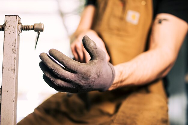 Free Photo mechanic repairing a bicycle