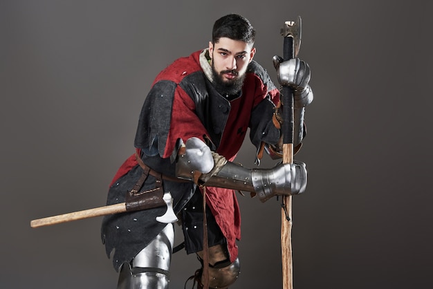 Medieval knight on grey