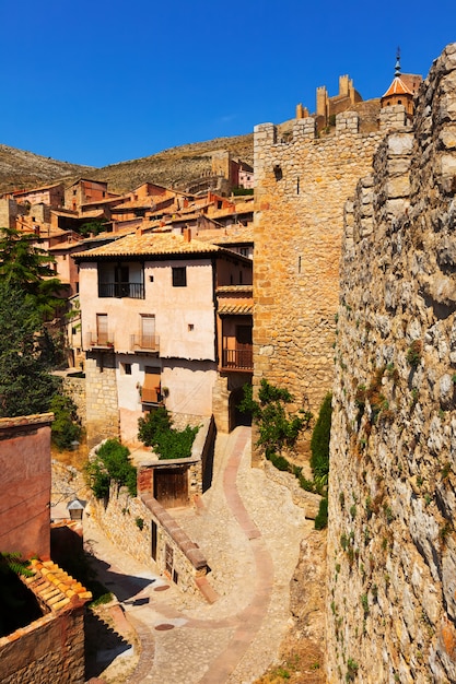 Free photo medieval street with old fortress