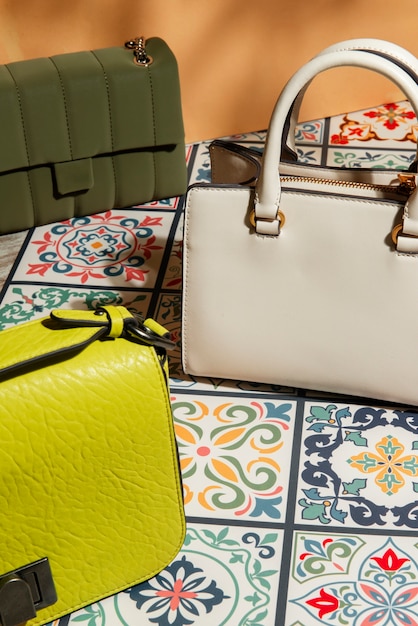 Free Photo mediterranean aesthetic tiles with women's bag