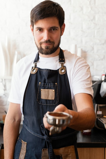 Medium shot barista at work