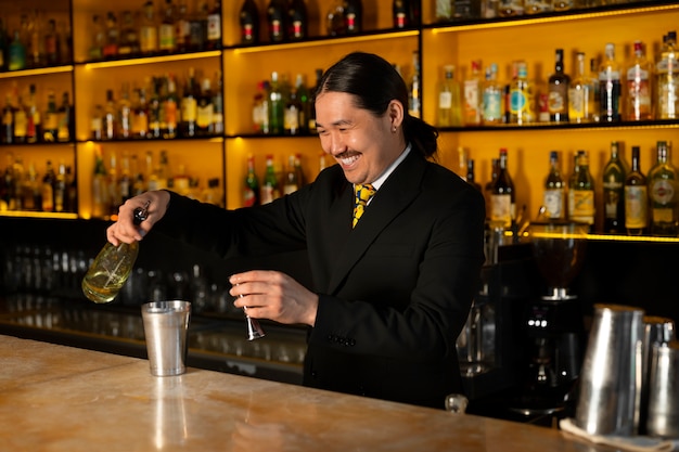 Medium shot bartender preparing drink