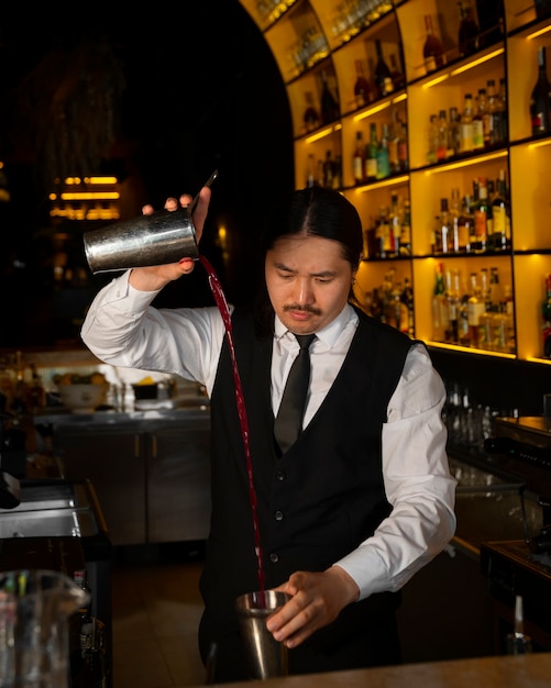 Medium shot bartender preparing drink