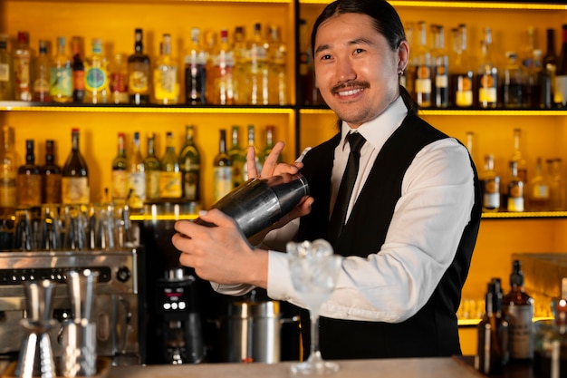 Medium shot bartender preparing drink