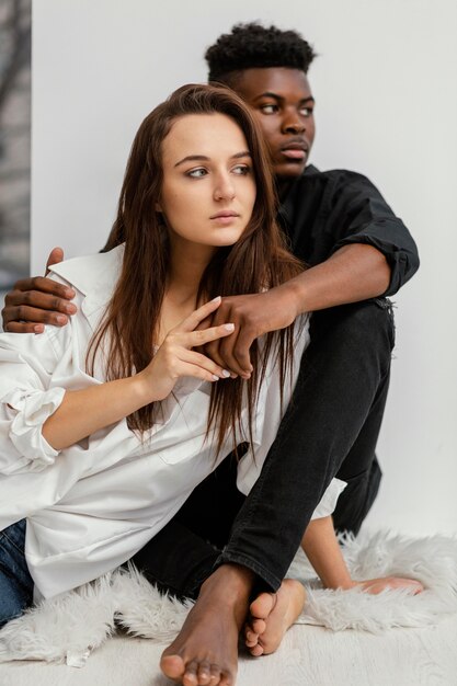 Medium shot black man and white woman