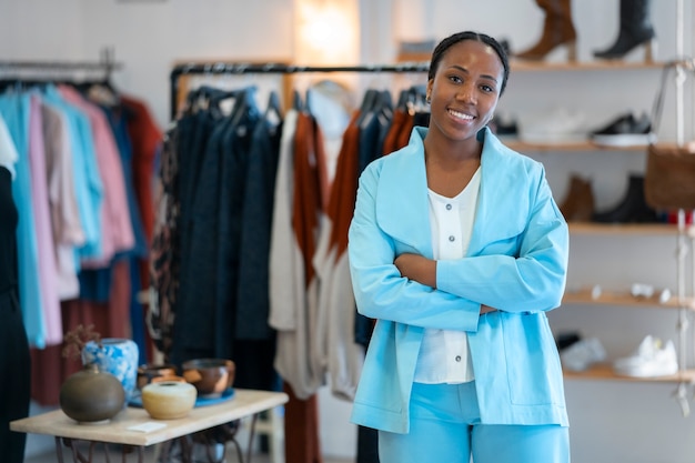 Free Photo medium shot black woman running a small business