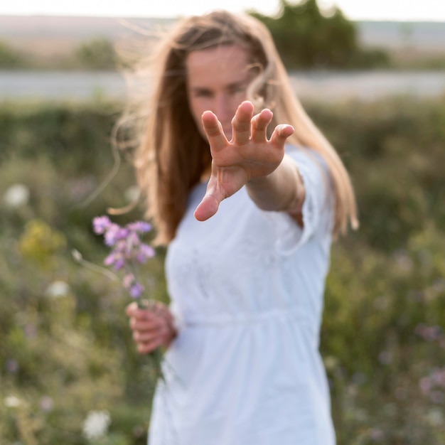 Free Photo medium shot blurred woman posing