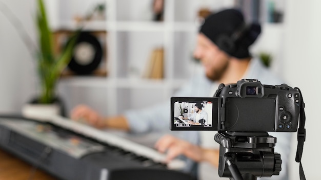 Medium shot blurry man recording himself