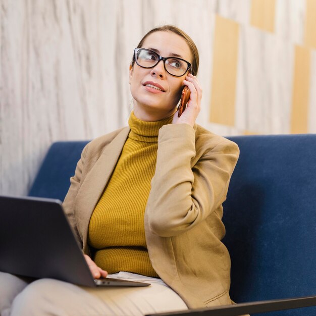 Medium shot business woman on phone