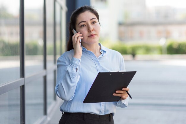 Medium shot busy woman entrepreneur