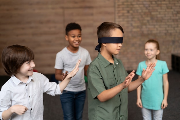 Free photo medium shot children playing together