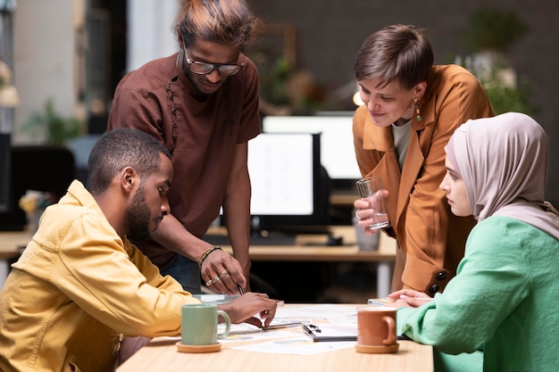 Medium shot colleagues in meeting