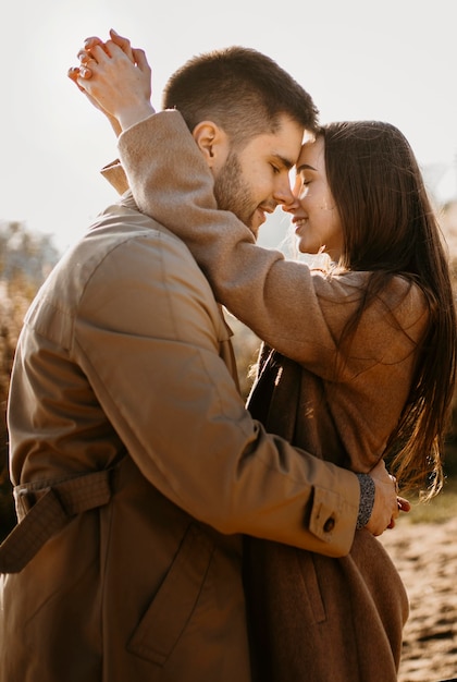 Medium shot couple being romantic