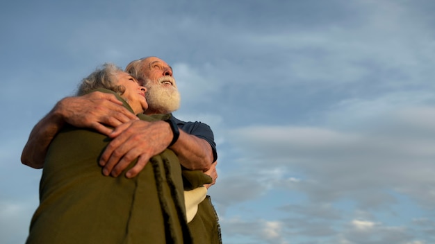 Medium shot couple hugging