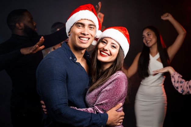 Medium shot of couple at new years party