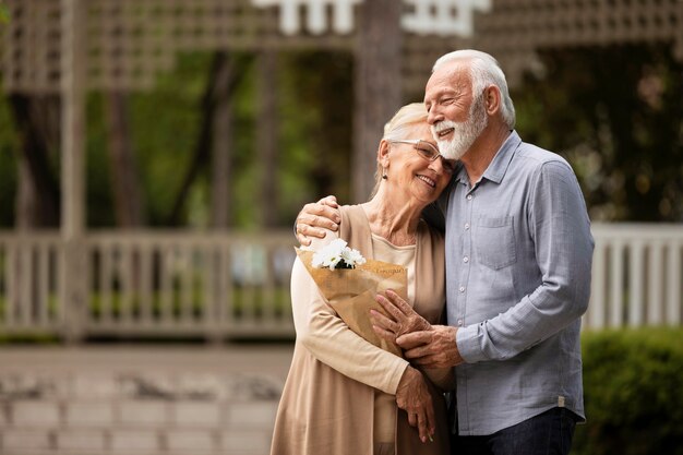 Medium shot couple standing together