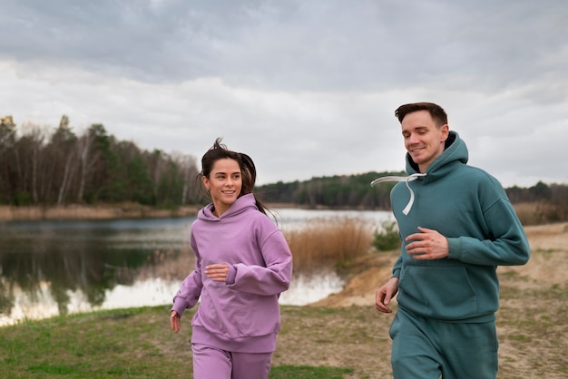 Medium shot couple training together