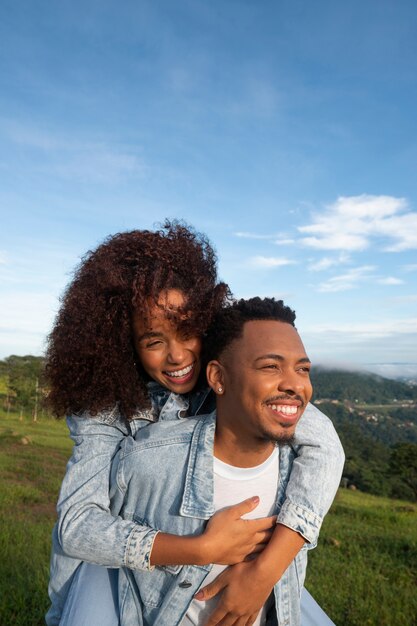 Medium shot cute couple outdoors