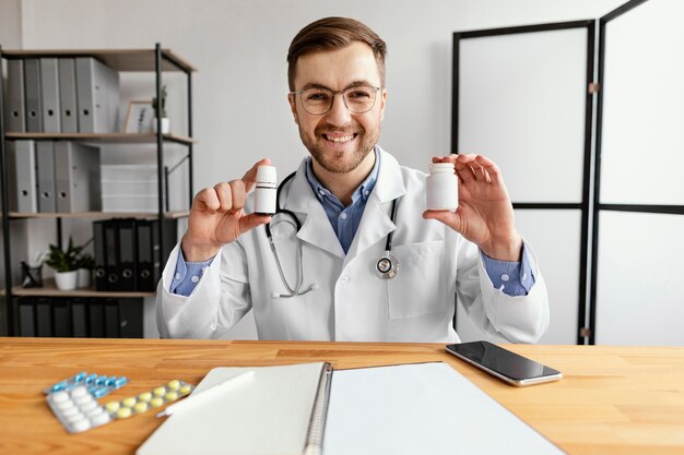 Medium shot doctor holding medicine